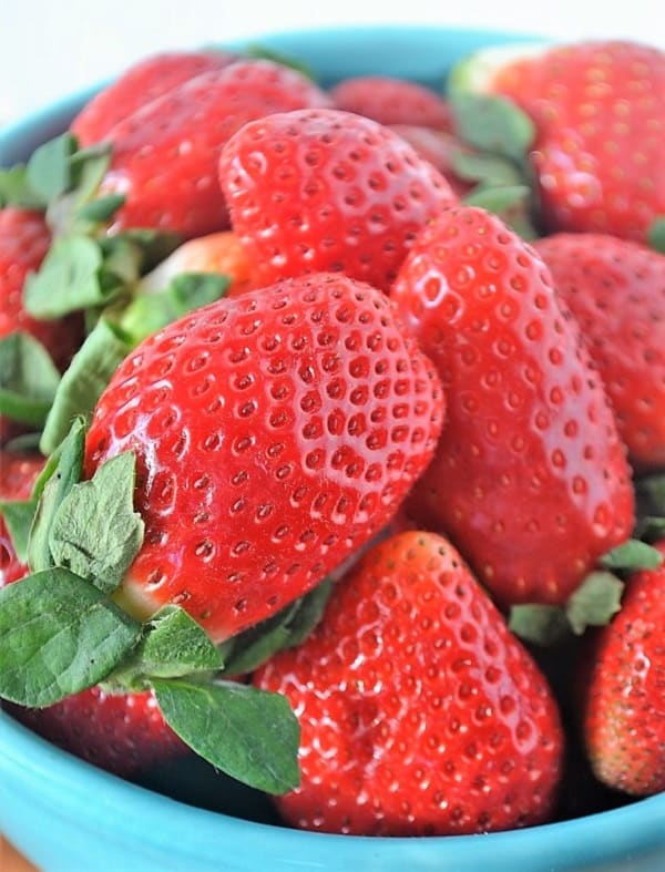 a bowl of fresh strawberries