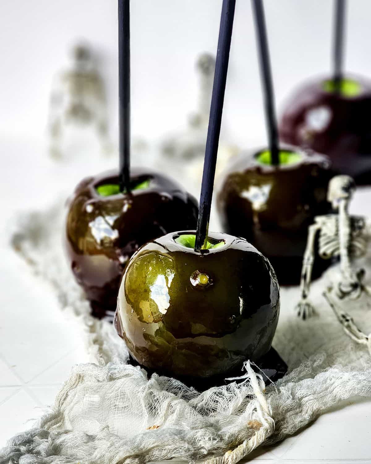 Apples dipped in a dark glaze. 