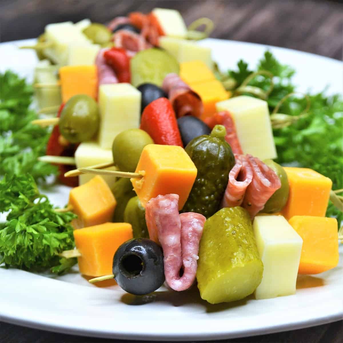 Vibrant party skewer appetizers with colorful fruits, vegetables, and cheese, ready to wow your guests