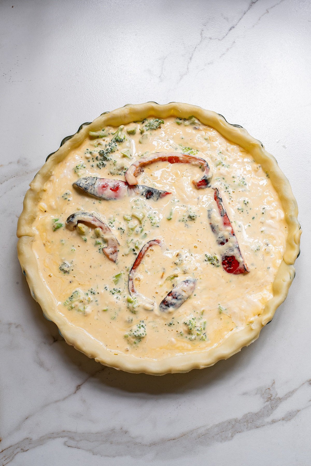 Add the egg mixture to the crust. 