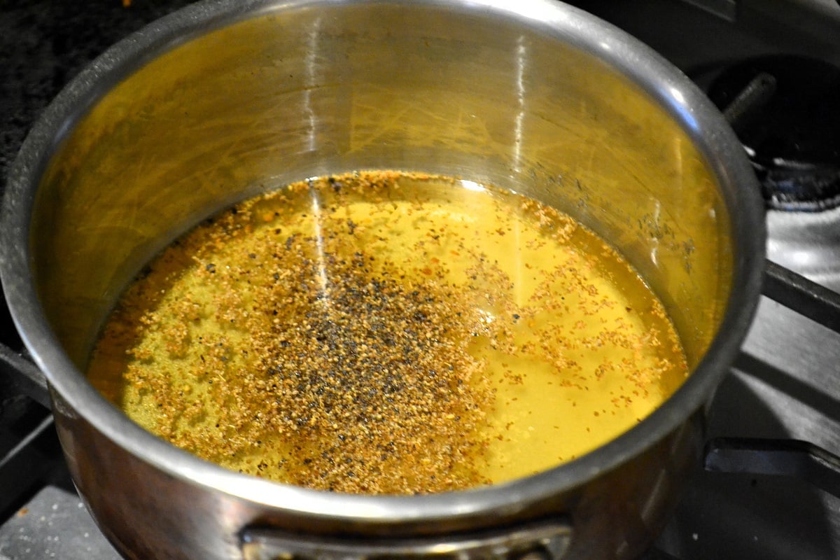 Coleslaw dressing is cooked on the stovetop. 