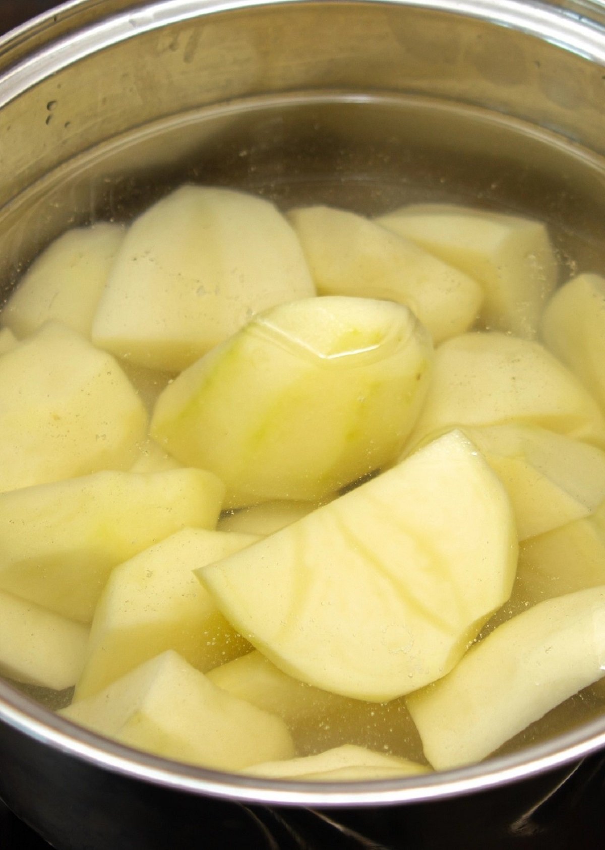Boil peeled potatoes until just tender.