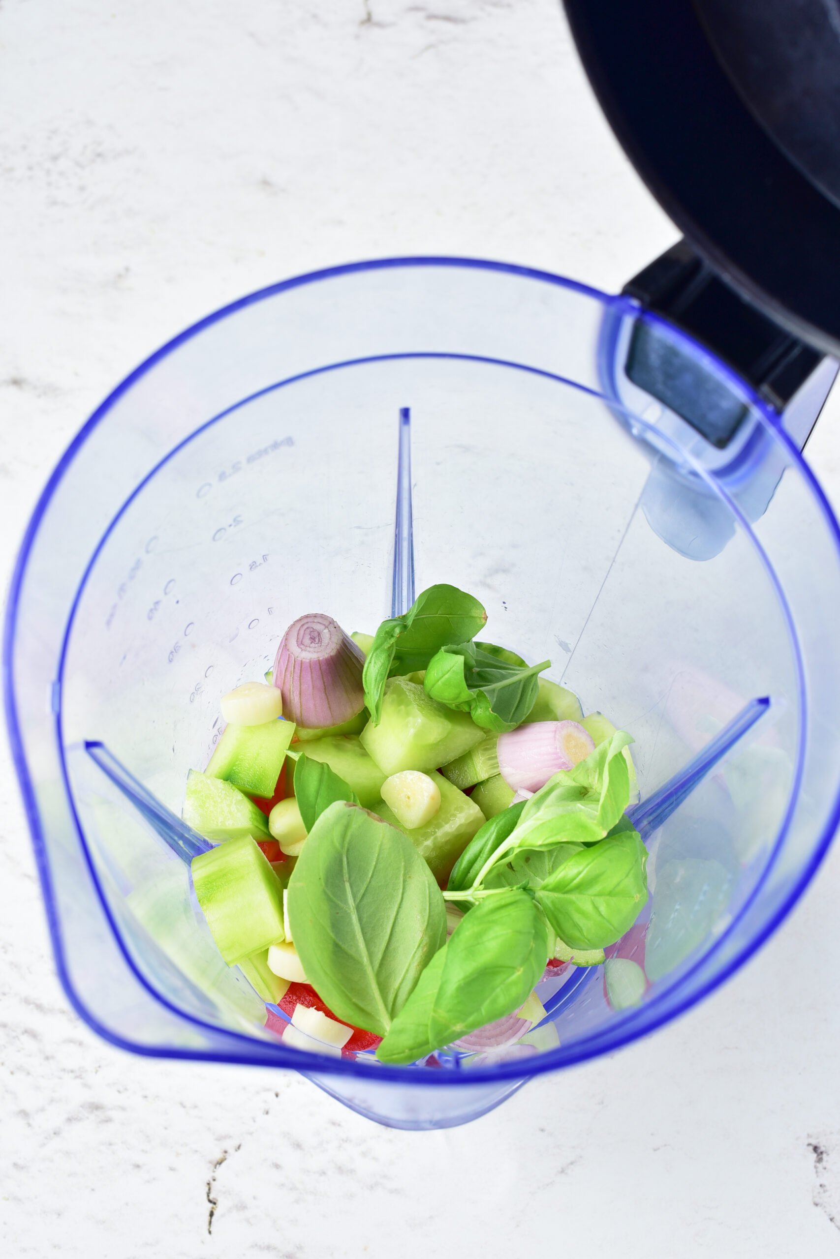 Gazpacho ingredients are in a blender.