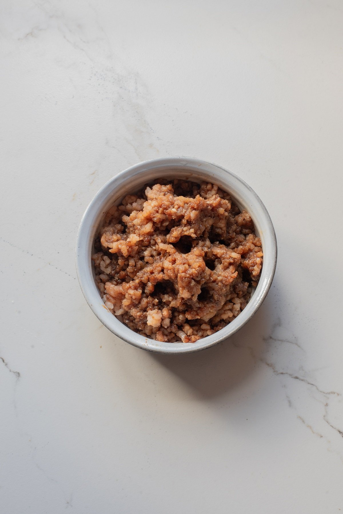 Ground chicken is combined with teriyaki sauce. 