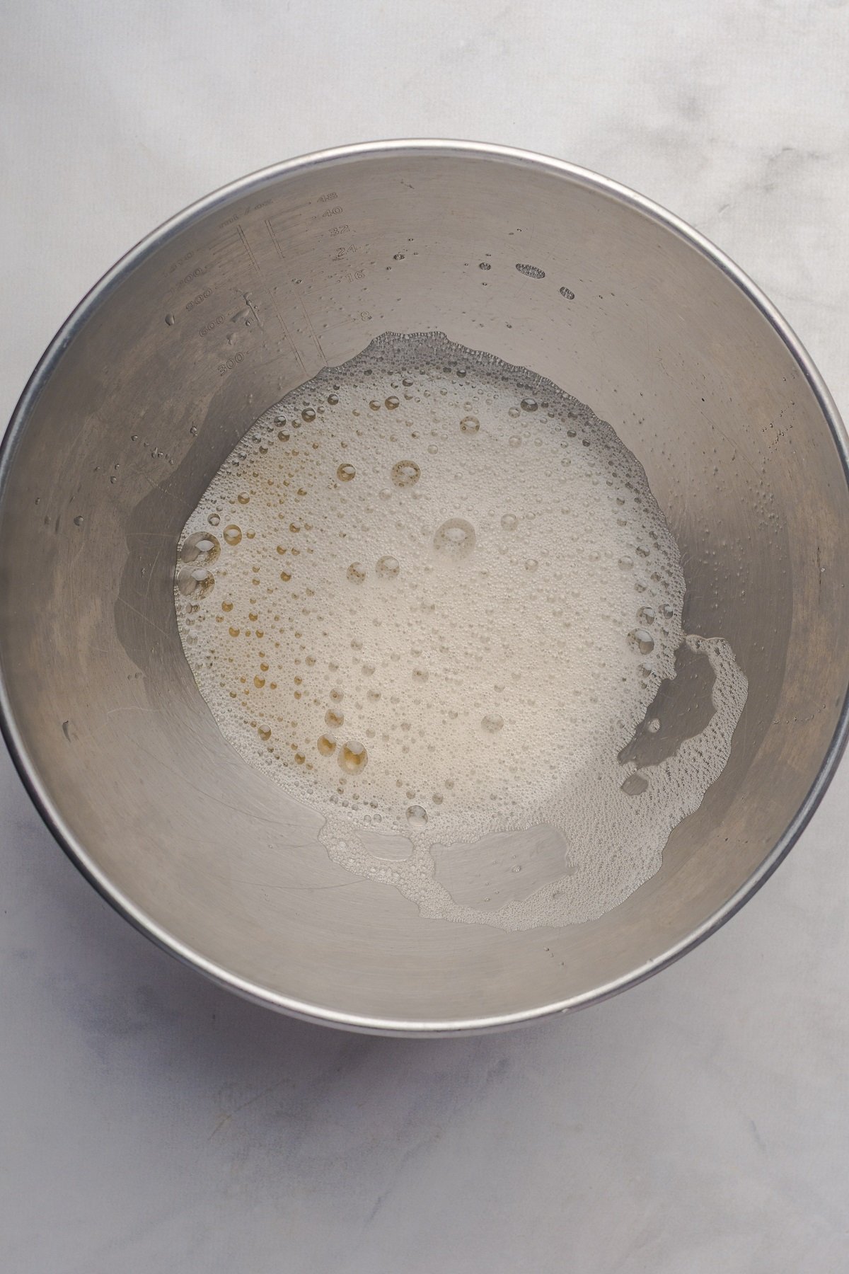 Frothed egg whites in a bowl.