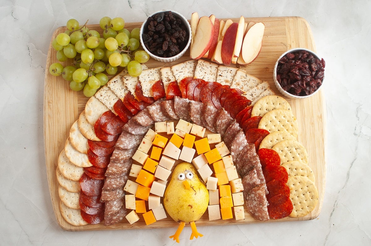 Fruit is added to round out the Thanksgiving charcuterie board.